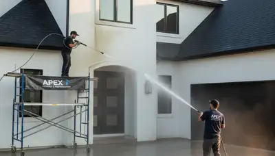 Professional pressure cleaning on home exterior in Champaign, IL by expert painters restoring surfaces